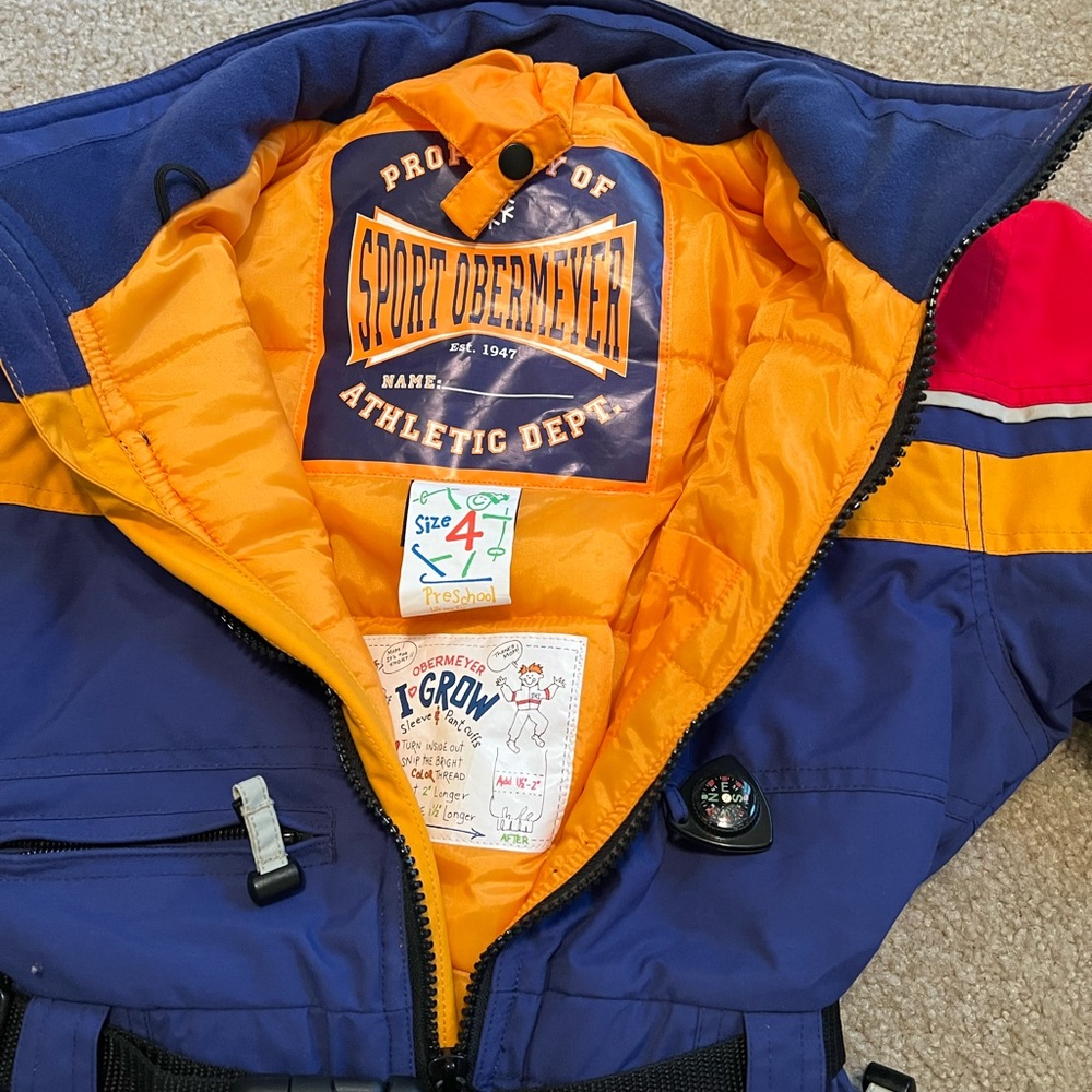 One piece ski-snow suit. Size 4,with grow with me option. Worn twice.